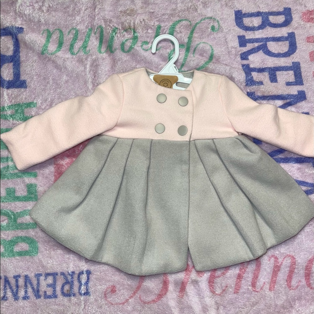 Beautiful jacket. No tags, but never worn. Size 0-3 months. $15